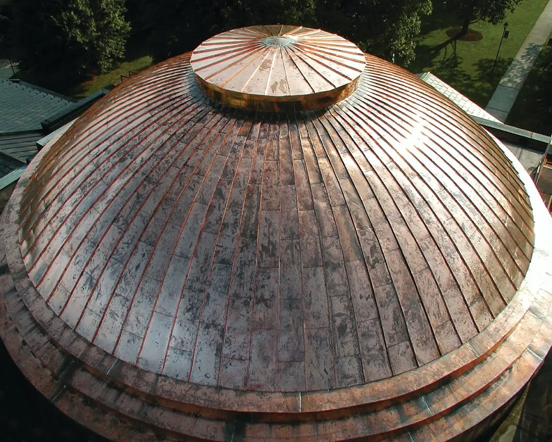 Craftsman Roofing crew installing a new roof in East Moriches